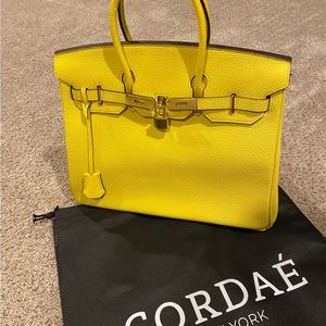 Cordaé New York, brand new.